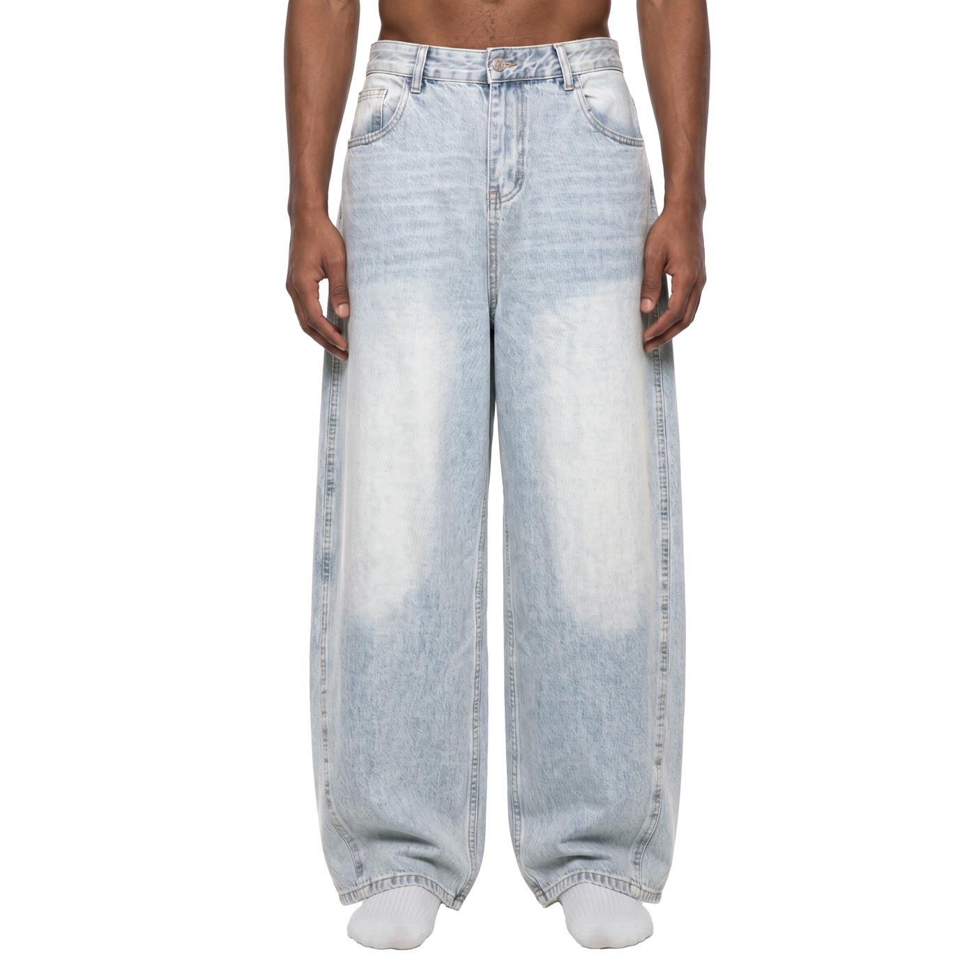 Light wash baggy barrel jeans, front view on male model showing balloon leg and bleached sunfade