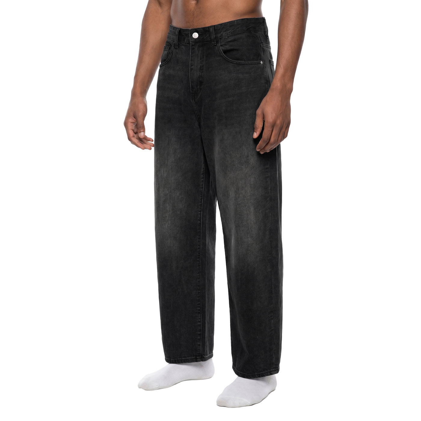 Black washed barrel leg jeans, front angle view showing relaxed fit through the thigh and tapered hem
