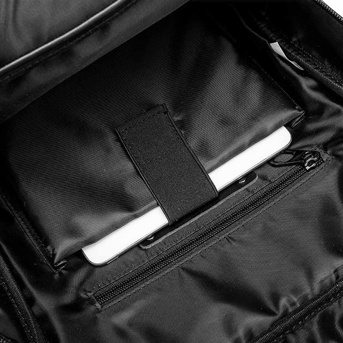 Interior of woven leather backpack with 15-inch laptop compartment