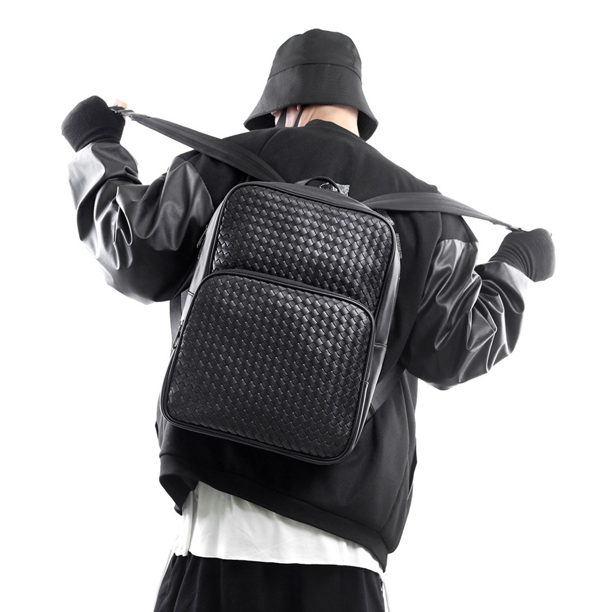 Woven Leather Backpack with Laptop Compartment in Black, worn by model