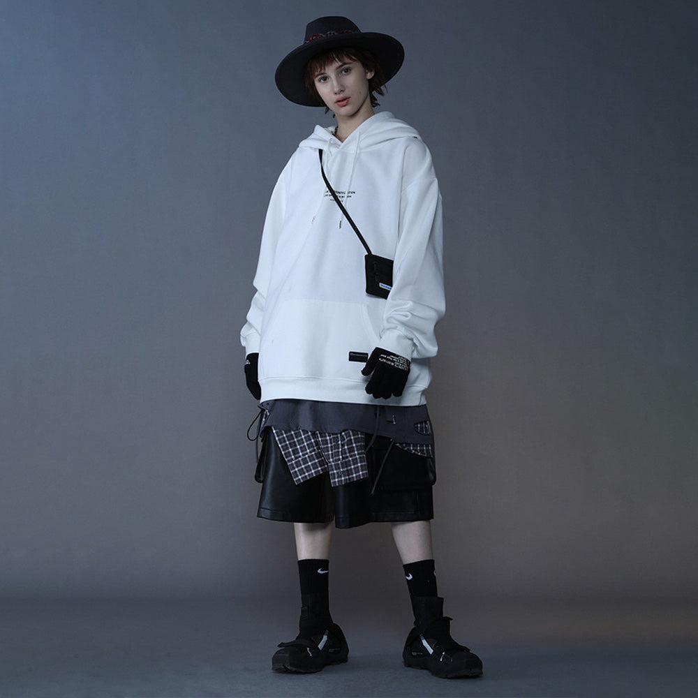 White Angel Hoodie in urban setting: Edgy statue graphic streetwear