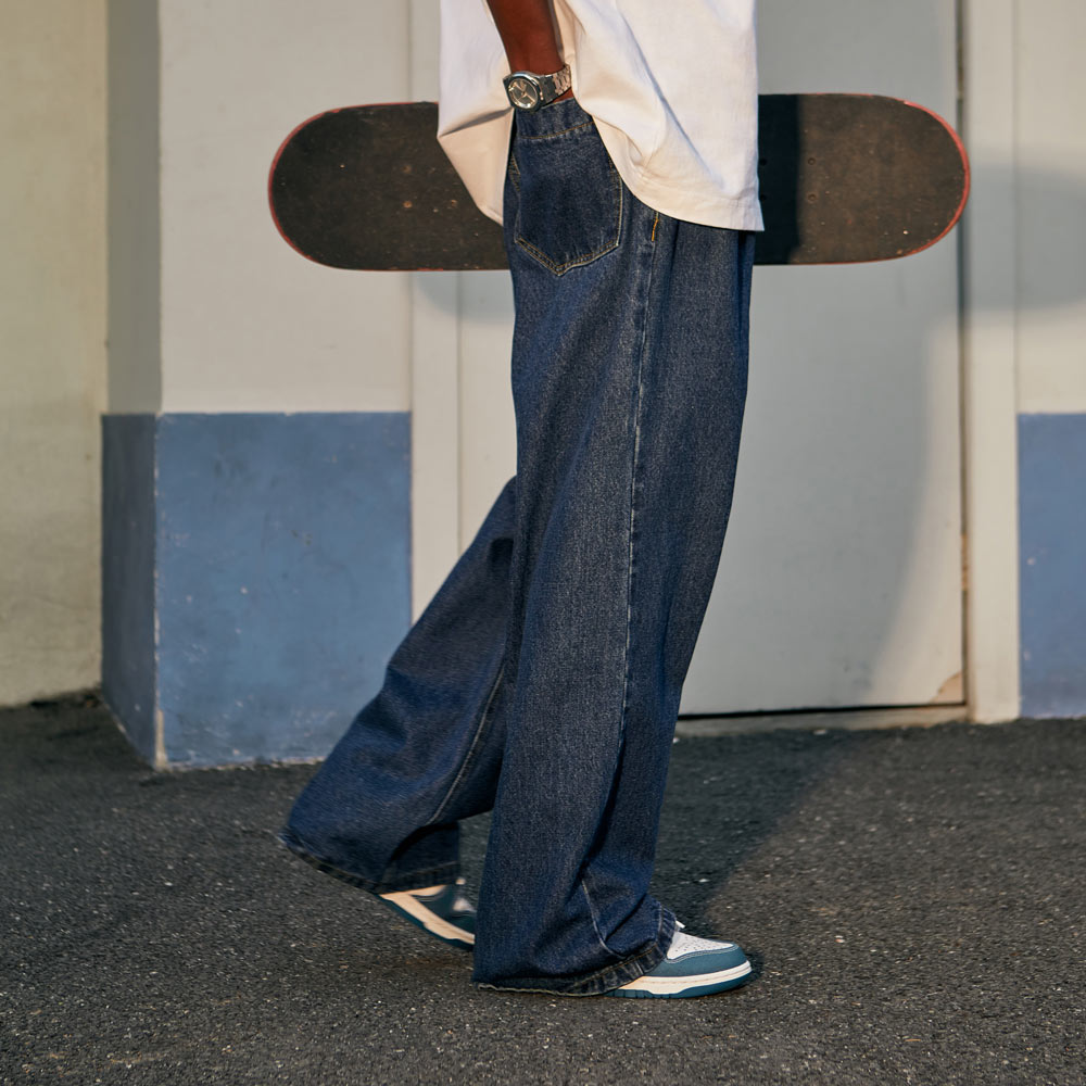 Skateboarding in Fashion: Timeless Style with Dark Blue Wide Leg Jeans
