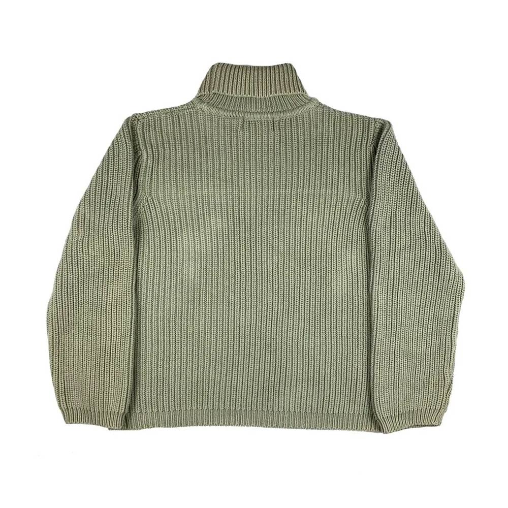 Retro streetwear aesthetic in army green vintage sweater