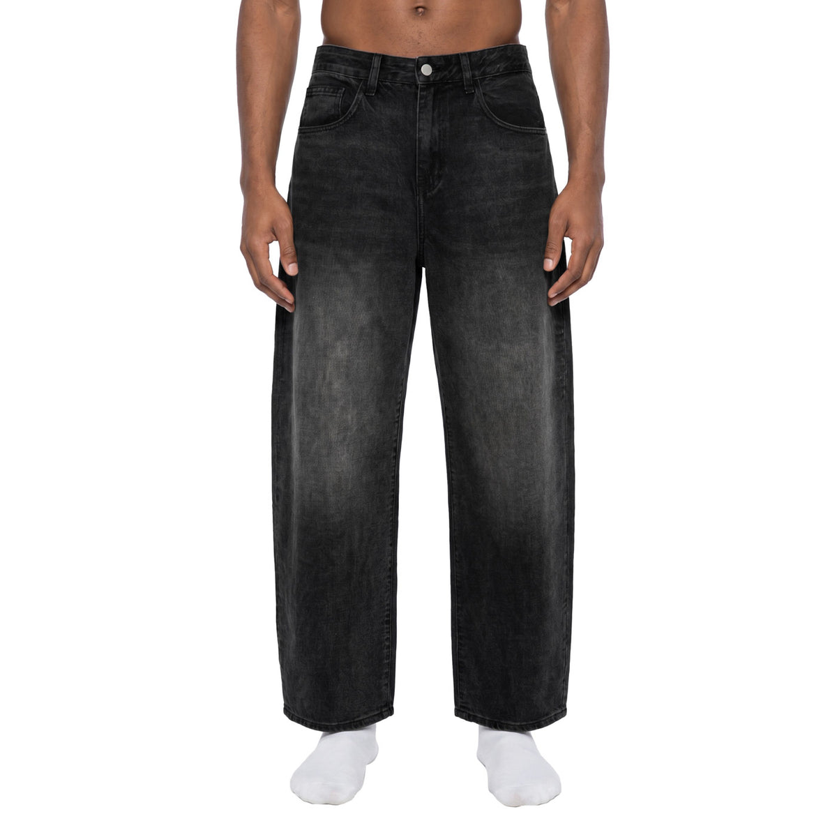 Washed barrel jeans in black, front view on male model showing baggy balloon leg and faded wash